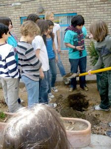 Planting tree in German school in Tehran